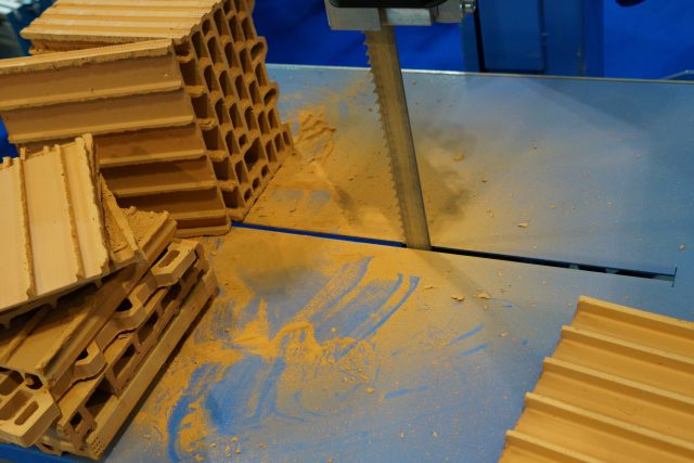 A brick and building block cutting machine.