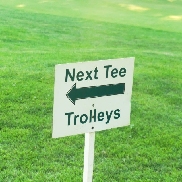 Next Tee Trolleys Golf Sign with Arrow